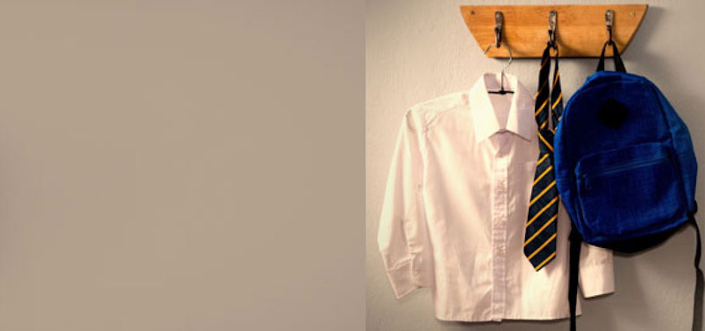 school uniform hanging on a hook